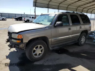 2002 GMC Yukon SLT with VIN 1GKEK13T32J193967, listed as a Copart auction lot 61248384 with 237,920 mi miles and Salvage Title. Bid and sale history available at carsss.com. Image 1.