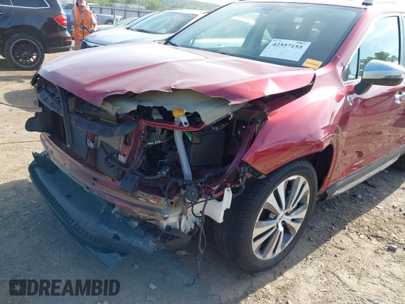 2019 Subaru Ascent Touring with VIN 4S4WMARD8K3433816, listed as a IAAI auction lot 42557155 with 58,753 mi miles and . Bid and sale history available at DreamBid. Image 6.