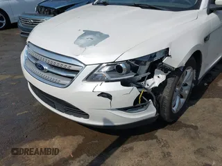 2012 Ford Taurus SEL with VIN 1FAHP2EW9CG121263, listed as a IAAI auction lot 41785838 with 185,433 mi miles and . Bid and sale history available at DreamBid. Image 6.