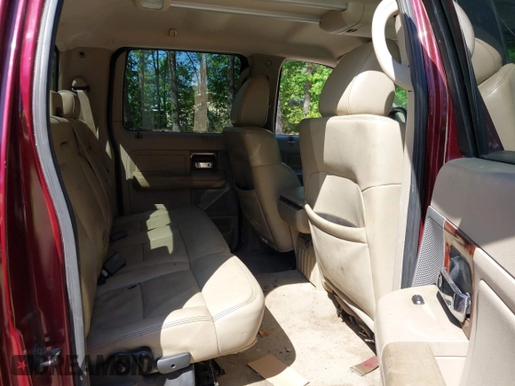 2006 Ford F-150 XLT with VIN 1FTPW14506FB81826, listed as a IAAI auction lot 42142287 with 136,768 mi miles. Bid and sale history available at carsss.com. Image 8.