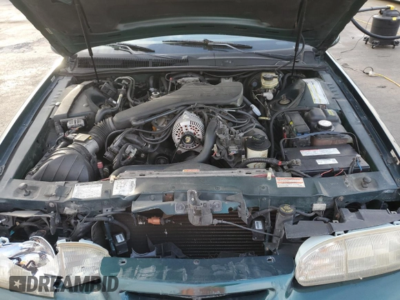 1994 Ford Thunderbird LX with VIN 1FALP62W6RH128762, listed as a Copart auction lot 84306604 with 68,314 mi miles and Salvage Title. Bid and sale history available at DreamBid. Image 12.
