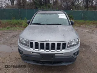 2017 Jeep Compass Sport with VIN 1C4NJCBA4HD123718, listed as a IAAI auction lot 41986191 with 140,109 mi miles and . Bid and sale history available at DreamBid. Image 12.