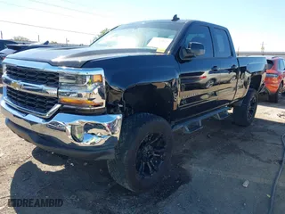 2016 Chevrolet Silverado 1500 LT with VIN 1GCVKREC1GZ310591, listed as a IAAI auction lot 40415032 with 157,205 mi miles. Bid and sale history available at carsss.com. Image 17.