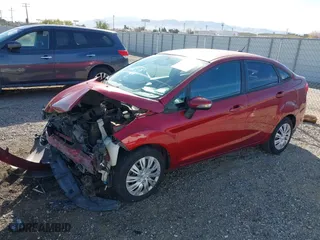2013 Ford Fiesta SE with VIN 3FADP4BJ2DM214653, listed as a IAAI auction lot 41714486 with 127,906 mi miles. Bid and sale history available at carsss.com. Image 2.