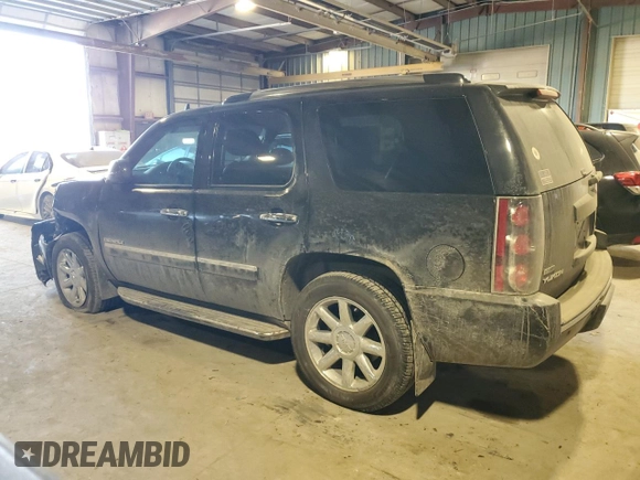 2011 GMC Yukon Denali with VIN 1GKS2EEF6BR321895, listed as a Copart auction lot 88364515 with 99,115 mi miles and Salvage Title. Bid and sale history available at DreamBid. Image 2.
