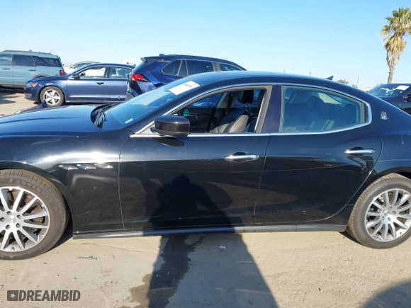 2014 Maserati Ghibli S Q4 with VIN ZAM57RTA2E1086046, listed as a IAAI auction lot 41846389 with 55,984 mi miles. Bid and sale history available at carsss.com. Image 14.