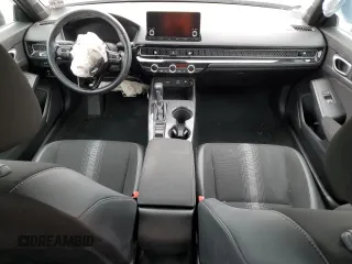 2023 Honda Civic Sport z VIN 2HGFE2F50PH556908, wystawiony jako Copart lot #52789655 z przebiegiem Nie podano mil oraz Szkoda całkowita • Salvage title. Historia ofert i sprzedaży dostępna na DreamBid. Obrazek 8.