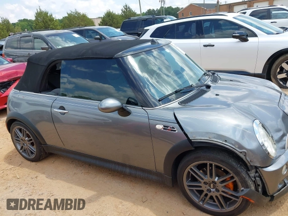 2006 MINI Convertible S with VIN WMWRH33516TF89141, listed as a IAAI auction lot 42273093 with 174,772 mi miles and . Bid and sale history available at DreamBid. Image 13.