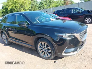 2018 Mazda CX-9 Grand Touring with VIN JM3TCBDYXJ0208962, listed as a IAAI auction lot 42629720 with 123,929 mi miles and . Bid and sale history available at DreamBid. Image 1.