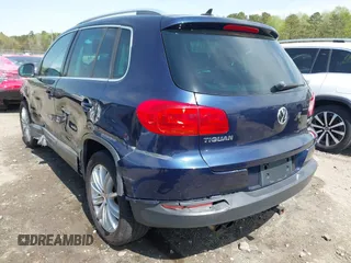 2012 Volkswagen Tiguan S with VIN WVGBV7AX3CW571039, listed as a IAAI auction lot 41928361 with 165,938 mi miles and . Bid and sale history available at DreamBid. Image 3.