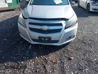 2013 Chevrolet Malibu LS with VIN 1G11B5SA9DU151072, listed as a IAAI auction lot 41939887 with 155,420 mi miles and . Bid and sale history available at DreamBid. Image 6.