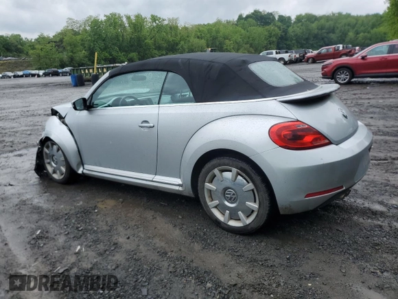 2013 Volkswagen Beetle 2.5L w/Sound/Nav z VIN 3VW5P7ATXDM812019, wystawiony jako Copart lot #56921485 z przebiegiem Nie podano mil oraz Szkoda całkowita • Salvage title. Historia ofert i sprzedaży dostępna na DreamBid. Obrazek 2.