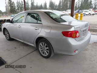 2009 Toyota Corolla with VIN JTDBL40E299069381, listed as a IAAI auction lot 41838258 with 197,992 mi miles. Bid and sale history available at carsss.com. Image 3.