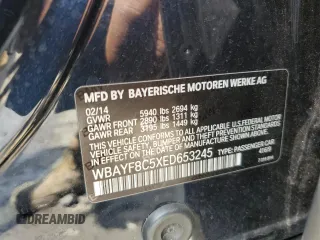 2014 BMW 7 Series ALPINA B7 xDrive with VIN WBAYF8C5XED653245, listed as a Copart auction lot 56010085 with 114,519 mi miles and Salvage title. Bid and sale history available at DreamBid. Image 13.