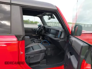 2023 Ford Bronco z VIN 1FMEE5DH5PLB93397, wystawiony jako IAAI lot #42531965 z przebiegiem 30 731 mil mil oraz . Historia ofert i sprzedaży dostępna na DreamBid. Obrazek 5.
