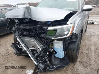 2024 Volkswagen Atlas SE with VIN 1V2HR2CA4RC593252, listed as a IAAI auction lot 41828371 with 7,317 mi miles and . Bid and sale history available at DreamBid. Image 6.
