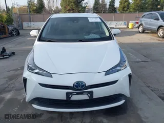 2021 Toyota Prius L Eco with VIN JTDKAMFU9M3131228, listed as a IAAI auction lot 41257117 with 72,840 mi miles. Bid and sale history available at carsss.com. Image 13.