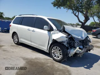 2015 Toyota Sienna XLE with VIN 5TDYK3DC1FS612491, listed as a Copart auction lot 53673815 with 169,306 mi miles and Salvage Title. Bid and sale history available at DreamBid. Image 4.