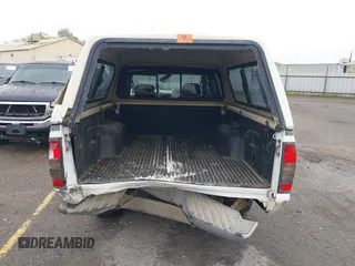 2004 Nissan Frontier XE with VIN 1N6DD26T54C403203, listed as a IAAI auction lot 41658314 with 203,648 mi miles and . Bid and sale history available at DreamBid. Image 17.