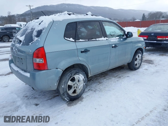2006 Hyundai Tucson GL with VIN KM8JM72B06U298904, listed as a IAAI auction lot 41370728 with 209,284 mi miles. Bid and sale history available at carsss.com. Image 4.
