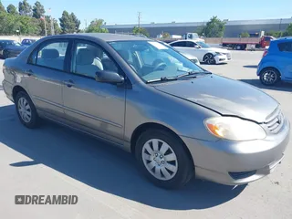 2004 Toyota Corolla CE with VIN 1NXBR32E64Z303089, listed as a IAAI auction lot 42147550 with 232,062 mi miles. Bid and sale history available at carsss.com. Image 1.