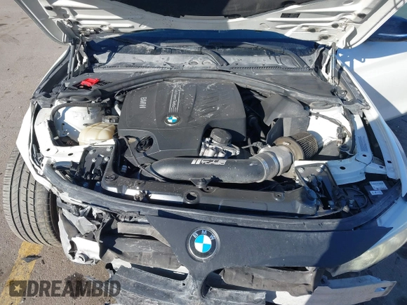 2014 BMW 4 Series 435i with VIN WBA3R1C56EK191996, listed as a IAAI auction lot 41450981 with 125,352 mi miles and . Bid and sale history available at carsss.com. Image 10.