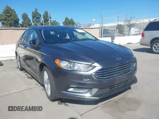 2018 Ford Fusion SE z VIN 3FA6P0LU1JR162070, wystawiony jako IAAI lot #41675644 z przebiegiem 193 284 mil mil oraz . Historia ofert i sprzedaży dostępna na DreamBid. Obrazek 1.
