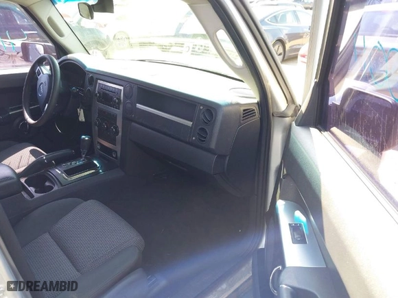 2010 Jeep Commander Sport with VIN 1J4RG4GK2AC105232, listed as a IAAI auction lot 41790011 with 192,281 mi miles. Bid and sale history available at carsss.com. Image 5.