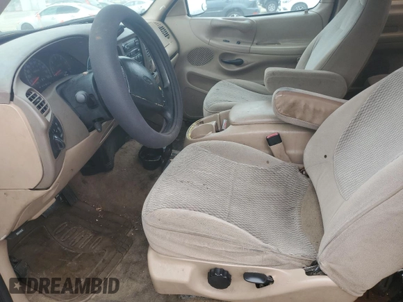 1997 Ford F-150 with VIN 2FTDX1726VCA74811, listed as a Copart auction lot 81909844 with 136,520 mi miles and Salvage title. Bid and sale history available at DreamBid. Image 7.