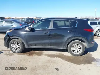 2019 Kia Sportage LX with VIN KNDPM3AC4K7534271, listed as a IAAI auction lot 41696261 with 71,386 mi miles. Bid and sale history available at carsss.com. Image 14.