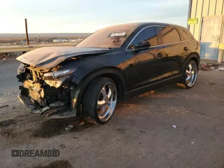 2019 Mazda CX-9 Sport с VIN JM3TCABY2K0325613, выставлен на аукционе Copart как лот 86679034 с пробегом 78 233 миль миль и Списание • Salvage title. История ставок и продаж доступна на DreamBid. Изображение 1.