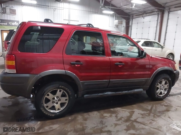 2003 Ford Escape XLT Popular 2 with VIN 1FMCU93173KA52806, listed as a IAAI auction lot 41696250 with 138,338 mi miles. Bid and sale history available at carsss.com. Image 13.
