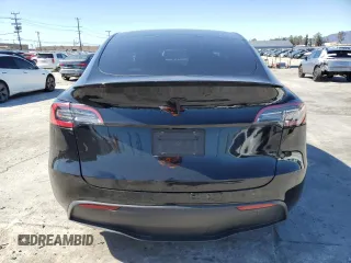 2022 Tesla Model Y Long Range z VIN 7SAYGDEE2NF442073, wystawiony jako Copart lot #49180135 z przebiegiem 34 742 mil mil oraz Szkoda całkowita • Salvage title. Historia ofert i sprzedaży dostępna na DreamBid. Obrazek 6.