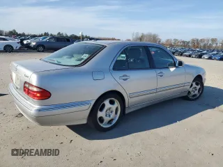 2000 Mercedes-Benz E-Class AWD with VIN WDBJF83J6YX032328, listed as a Copart auction lot 81353974 with 156,729 mi miles and Clean Title. Bid and sale history available at carsss.com. Image 3.