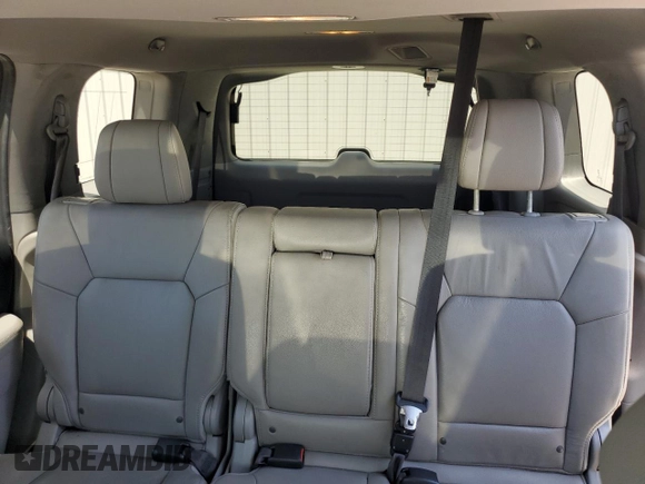 2015 Honda Pilot EX-L z VIN 5FNYF3H56FB004678, wystawiony jako Copart lot #53376705 z przebiegiem 117 910 mil mil oraz Szkoda całkowita • Salvage title. Historia ofert i sprzedaży dostępna na DreamBid. Obrazek 10.