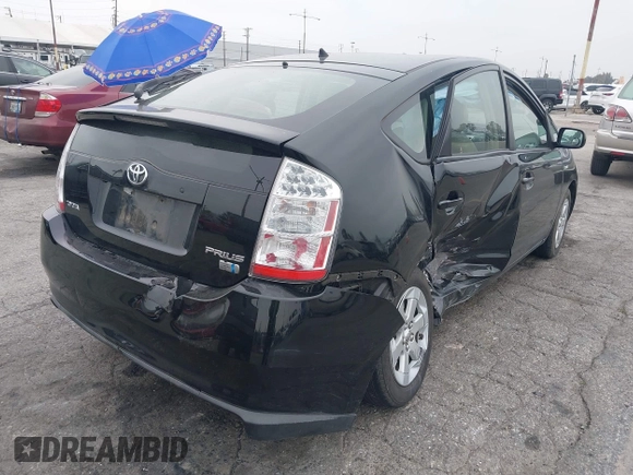 2009 Toyota Prius with VIN JTDKB20U693523309, listed as a IAAI auction lot 41885061 with 136,916 mi miles and . Bid and sale history available at DreamBid. Image 4.