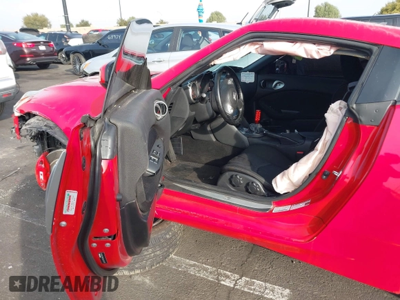 2014 Nissan 370Z Nismo with VIN JN1AZ4EH9EM636306, listed as a IAAI auction lot 41467766 with 101,021 mi miles and . Bid and sale history available at DreamBid. Image 5.