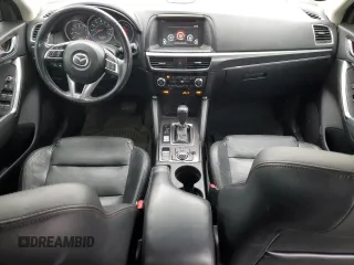 2016 Mazda CX-5 Grand Touring with VIN JM3KE4DY5G0691013, listed as a Copart auction lot 44700235 with 106,097 mi miles and Clean Title. Bid and sale history available at carsss.com. Image 8.