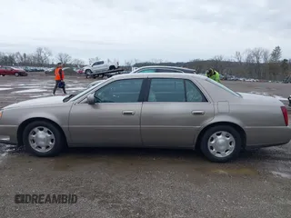 2002 Cadillac DeVille z VIN 1G6KD54Y32U108623, wystawiony jako IAAI lot #41957171 z przebiegiem 136 941 mil mil oraz . Historia ofert i sprzedaży dostępna na DreamBid. Obrazek 14.
