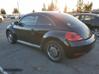 2012 Volkswagen Beetle 2.5L w/Sound/Nav PZEV with VIN 3VWJP7AT1CM623160, listed as a Copart auction lot 88076215 with 112,894 mi miles and Salvage Title. Bid and sale history available at carsss.com. Image 2.