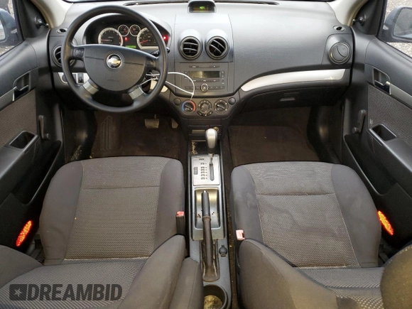 2007 Chevrolet Aveo LS z VIN KL1TD56607B126715, wystawiony jako Copart lot #85206134 z przebiegiem 85 420 mil mil oraz Szkody całkowita. Historia ofert i sprzedaży dostępna na DreamBid. Obrazek 8.