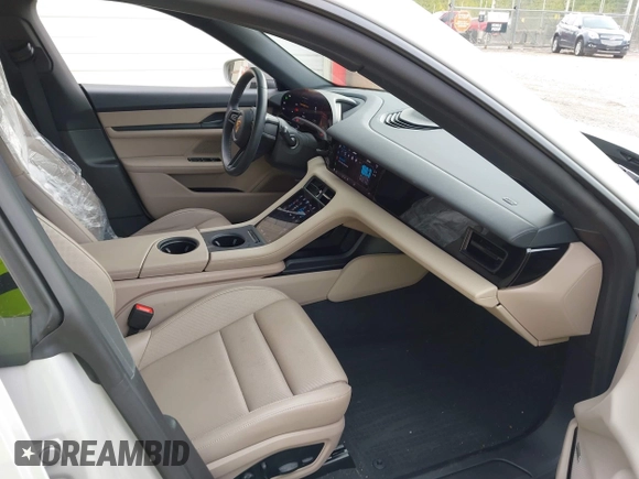 2024 Porsche Taycan with VIN WP0AA2Y11RSA12415, listed as a IAAI auction lot 41511772 with 12,066 mi miles and . Bid and sale history available at DreamBid. Image 5.