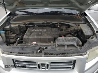 2006 Honda Ridgeline RTL z VIN 2HJYK16546H544183, wystawiony jako Copart lot #57426655 z przebiegiem 162 878 mil mil oraz Szkoda całkowita • Salvage title. Historia ofert i sprzedaży dostępna na DreamBid. Obrazek 11.