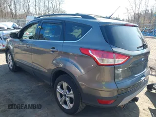 2013 Ford Escape SE with VIN 1FMCU9G94DUC98363, listed as a IAAI auction lot 41752773 with 150,547 mi miles and . Bid and sale history available at DreamBid. Image 3.