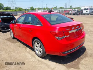 2014 Chevrolet Cruze 1LT z VIN 1G1PC5SBXE7230301, wystawiony jako IAAI lot #42403785 z przebiegiem 141 630 mil mil oraz . Historia ofert i sprzedaży dostępna na DreamBid. Obrazek 3.