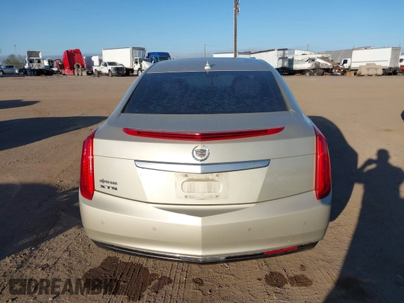 2014 Cadillac XTS with VIN 2G61L5S30E9207777, listed as a IAAI auction lot 41202654 with 112,565 mi miles. Bid and sale history available at carsss.com. Image 16.
