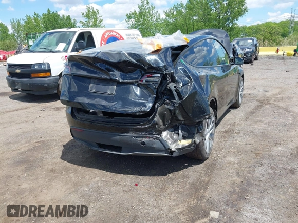 2023 Tesla Model Y Long Range with VIN 7SAYGDEE0PA183891, listed as a IAAI auction lot 42205573 with 41,273 mi miles and . Bid and sale history available at DreamBid. Image 6.