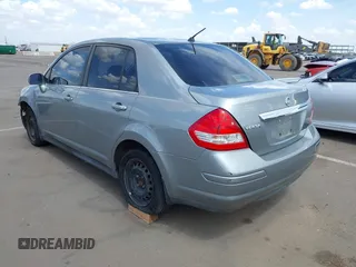 2009 Nissan Versa 1.8 S with VIN 3N1BC11E39L381507, listed as a IAAI auction lot 41956643 with 120,730 mi miles. Bid and sale history available at carsss.com. Image 3.