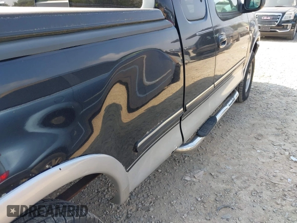 1998 Ford F-150 with VIN 2FTRX18L2WCA30075, listed as a IAAI auction lot 42687836 with 270,580 mi miles and . Bid and sale history available at DreamBid. Image 12.