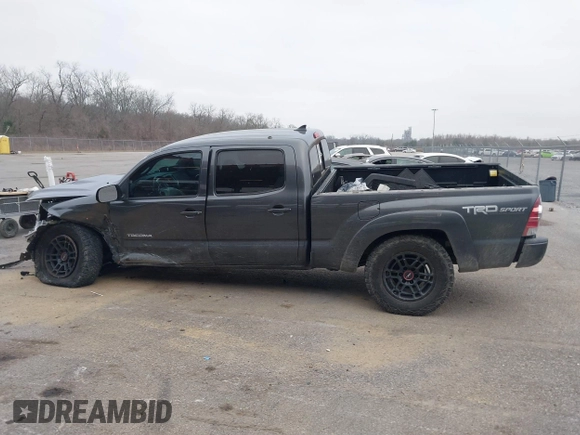 2014 Toyota Tacoma z VIN 3TMMU4FN9EM066292, wystawiony jako IAAI lot #41542492 z przebiegiem 122 308 mil mil oraz . Historia ofert i sprzedaży dostępna na DreamBid. Obrazek 13.
